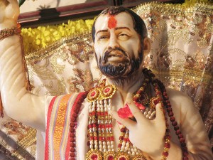 ramakrishna-with-red-flowers